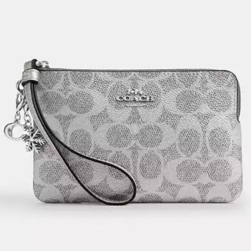 Coach Boxed Corner Zip Wristlet
In Signature Canvas With Charms nwt